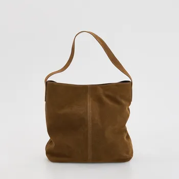 Reserved Semišová kabelka zlatavá hnědá