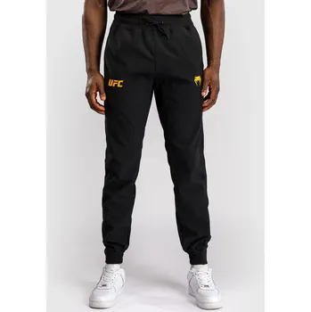 Pánské tepláky UFC Fusion by Venum Fight Week - černo/zlaté - VNMUFC-00300-126 Velikosti: XL