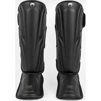 Chránič holeně pro bojový sport Chrániče holení VENUM CHALLENGER - černo/zlaté - VENUM-2050-BC-BC Velikosti: L