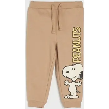 Chlapecké kalhoty Sinsay - Tepláky jogger Snoopy - béžová - 7602Z-80X - 7602Z-80X-74