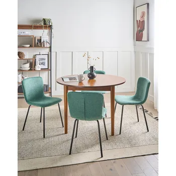 Jídelní židle Sada 4 jídelních židlí zelená látkové čalounění vykrojené operadlo černé kovové nohy moderní styl kuchyně jídelna Beliani