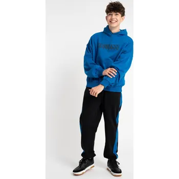 Reporter Young | Chlapecké černé tepláky OVERSIZE s modrým lampasem - Barva ČERNÁ, Velikost 158 253-0117B-64-100-1