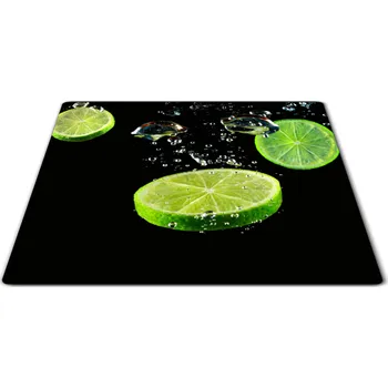 Kuchyňské prkénko Glasdekor Skleněné prkénko limetky na černém podkladu Prkénko: 30x20cm