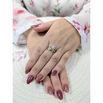 Prsten Zlatý dvojitý prsten s centrálním kamenem a nekonečnem Velikost prstenu: 53, Váha: 2,77, Ryzost: 14kt (585/1000)