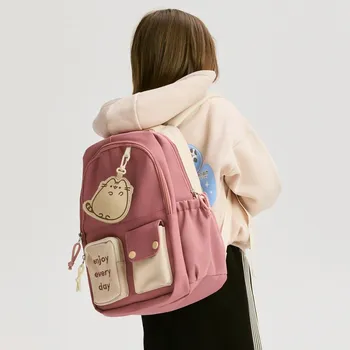 Kabelka Reserved Batoh Pusheen s přívěskem pudrově růžová