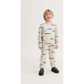 Dětské bavlněné tepláky Liewood LW15046 béžová 08X, vel. 56