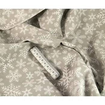 Bavlněné plátno - bílé sněhové vločky na šedém podkladu - šířka 160 cm