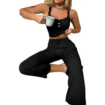 Dámské pyžamo Dámské pyžamo s tílkem a kalhotami Jednobarevný elegantní komplet z lehkého polyesteru a pružného spandexu dostupný v různých barvách černá XS