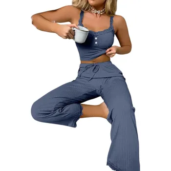 Dámské pyžamo Dámské pyžamo s tílkem a kalhotami Jednobarevný elegantní komplet z lehkého polyesteru a pružného spandexu dostupný v různých barvách modrá XS