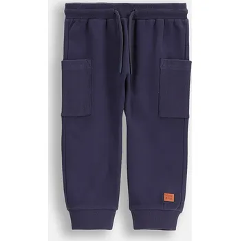 Kojenecké bavlněné tepláky Coccodrillo tmavomodrá barva, SAGE TIME BOY NEWBORN WC5120101SBN 59X, vel. 74