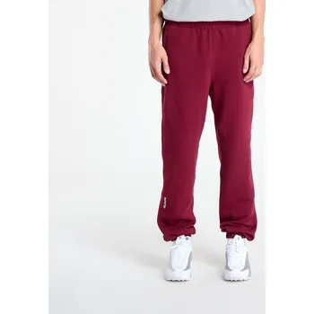 Tepláky Nike x NOCTA Fleece CS Sweatpants Dark Beetroot/ Citron Tint XS
