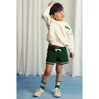 Dívčí kraťasy Dětské bavlněné šortky Mini Rodini 2523013975 zelená 77X, vel. 92-98