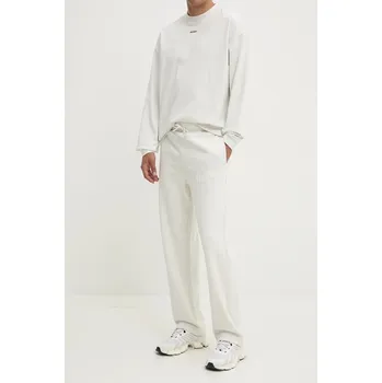 Bavlněné tepláky HUGO Dumrulo béžová barva, s potiskem, 50529110 01X, vel. L