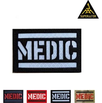 Zdravotník, reflexní nápis MEDIC, nášivka na suchý zip, Velcro Patch. 5 x 8 cm Barva: Černá-bílá