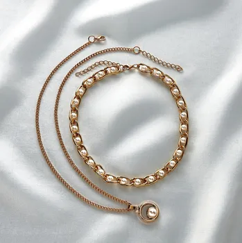 Hodinky 3Pagen 2dílná sada šperků s kultivovanými perlami Délka náhrdelníku 38 cm + 5 cm prodloužení. Délka řetízku 48 cm + 5 cm, přívěsek průměr 15 mm.