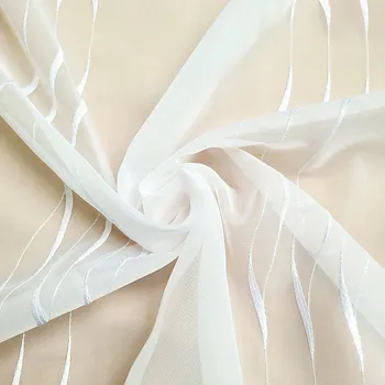 GERSTER Vyšívaná luxusní záclona bílá 300 cm