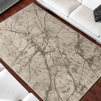 Koberec Béžový koberec s abstraktním vzorem