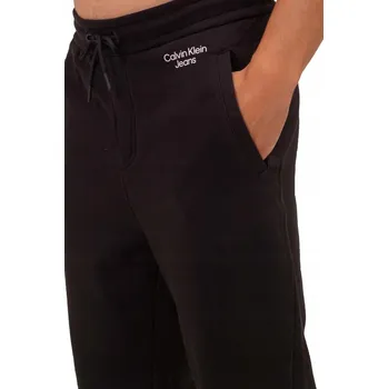 Calvin Klein Jeans pánské tepláky EO/STACKED HWK P černé, velikost M