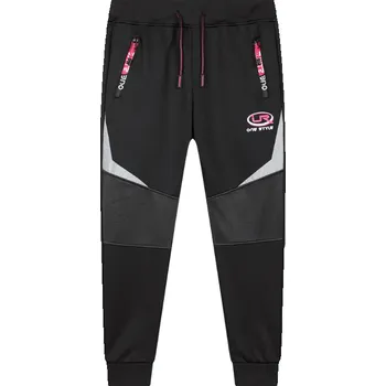 Dívčí kalhoty Dívčí softshellové tepláky černé Kugo GK8653