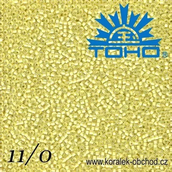 Korálek Korálky TOHO tvar ROUND (kulaté). Velikost 11/0. Barva č. 182-Inside-Color Luster Crystal/Opaque Yellow Lined . Balení 8g.