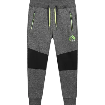 Pánské kalhoty Pánské softshellové tepláky šedé Kugo GK8656