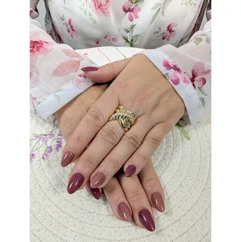 Prsten Zlatý dámský prsten s motivem spleteného uzlu Velikost prstenu: 55, Váha: 2,87, Ryzost: 14kt (585/1000)