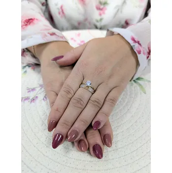 Prsten Dámský zlatý dvojitý prsten s centrálním kamenem a ozdobený zirkony Velikost prstenu: 56, Váha: 2,29, Ryzost: 14kt (585/1000)