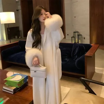 Dámský kabát Best Fashion Dlouhý dámský kabát z vlny s páskem a širokým kožešinovým límcem Velikost: M, Barva (Varianta): Bílá