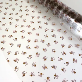 Balící papír Celofán balící, potisk včelky šíře 70 cm