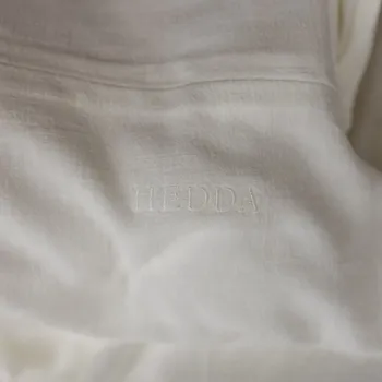 Povlečení HEDDA Lněné povlečení Naira krémové - povlak na polštář rozměr: 40 x 40 cm