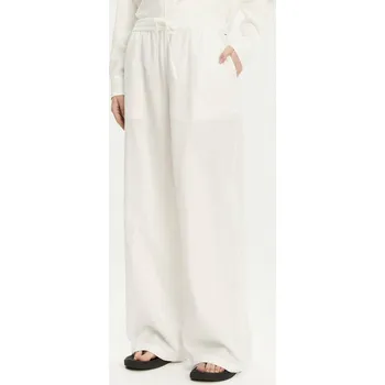 Dámské kalhoty Tommy Jeans dámské bílé kalhoty 20008062-2224756