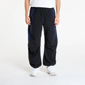 Pánské kalhoty Kalhoty Nike Tech Men's Dri-FIT Woven Color-Block Oversized Pants Black/ Obsidian/ Black L