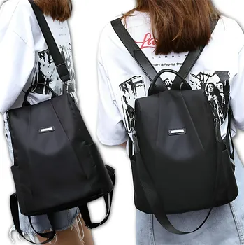 Městský batoh Camerazar Dámský černý nepromokavý městský batoh přes rameno