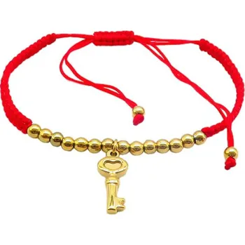 Náramek Náramek s klíčem a červenou šňůrkou, zlaté korálky, délka klíče 20x8mm, průměr korálků 4mm, váha 5g.