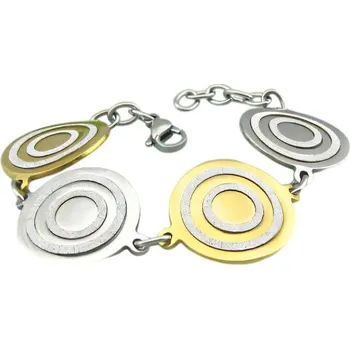 Náramek Náramek s kruhovými motivy ve stříbrné a zlaté barvě, průměr ozdob 26 mm, váha 27,3 g.