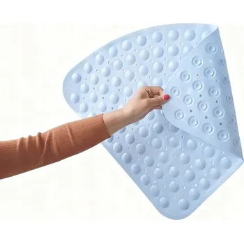 Obraz Půlkruhová prostiskluzová podložka do sprchového koutu – bezpečná a odolná