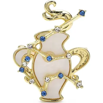 Brož B-TOP Pozlacená brož se znamením zvěrokruhu s modrými a čirými krystaly znamení: Vodnář (21.1.- 20.2.) &nbsp; &nbsp; &nbsp; &nbsp; &nbsp; &nbsp; &nbsp; &nbsp;