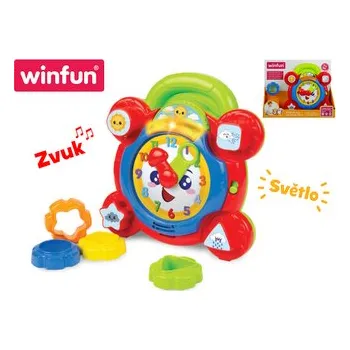 Hračka pro nejmenší Vkládačka hodiny veselé 22cm pohyblivé části na baterie se světlem a zvukem 9m+ v krabičce