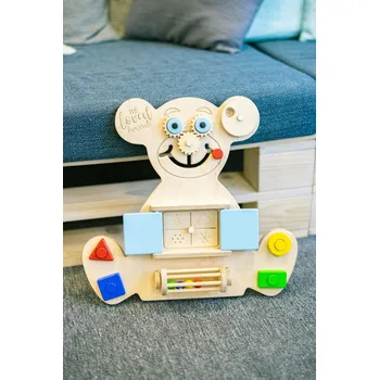 Hračka pro nejmenší Beloved boards Vzdělávací medvídek BUSY BOARD - MINI modré dvířka