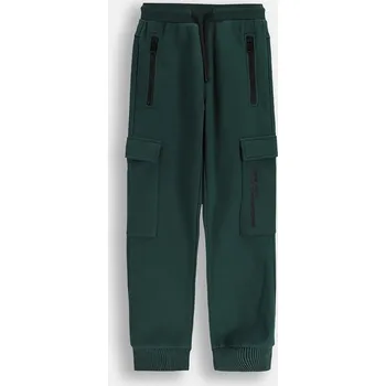 Dětské bavlněné kalhoty Coccodrillo ZC5120101CBJ tyrkysová 67X, vel. 134