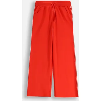 Chlapecké kalhoty Dětské tepláky Coccodrillo ZC5120104FGJ červená 29X, vel. 140