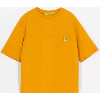 MUFFIN MODE Ležérní oversized tričko s krátkým rukávem z organické bavlny, žluté Velikost: 98/104