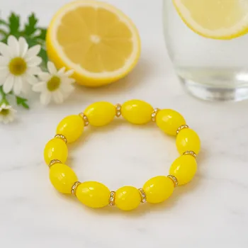 Náramek Náramek žlutý se zlatými ozdobami