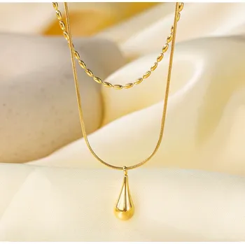 Náhrdelník B-TOP Dvojitý náhrdelník z nerezové oceli s kapkovitými detaily Druh barvy: Zlatá