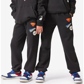DECATHLON Dětské tepláky Superman 10 LET ČERNÁ