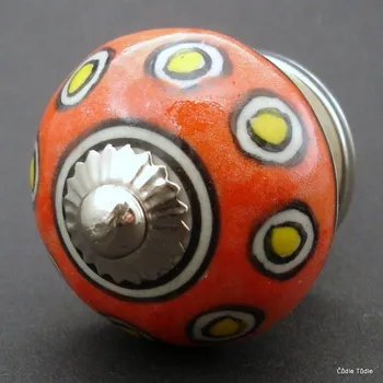 Nábytkové kování Nábytková úchytka bílá s oranžovou kresbou 4 cm - knopka