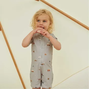 Kojenecký overall LIEWOOD Plavecký overal Max - Vehicles/Dove blue Velikost: 3m