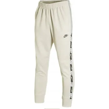 Pánské kalhoty Nike pánské tepláky béžové velikost L