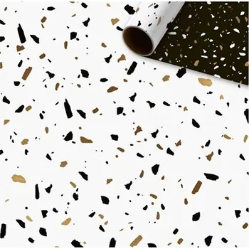 Balící papír Balicí papír černobílý se zlatými konfetami