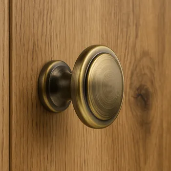 Nábytkové kování Interex Úchytka knopka SIMON Kartáčovaná mosaz